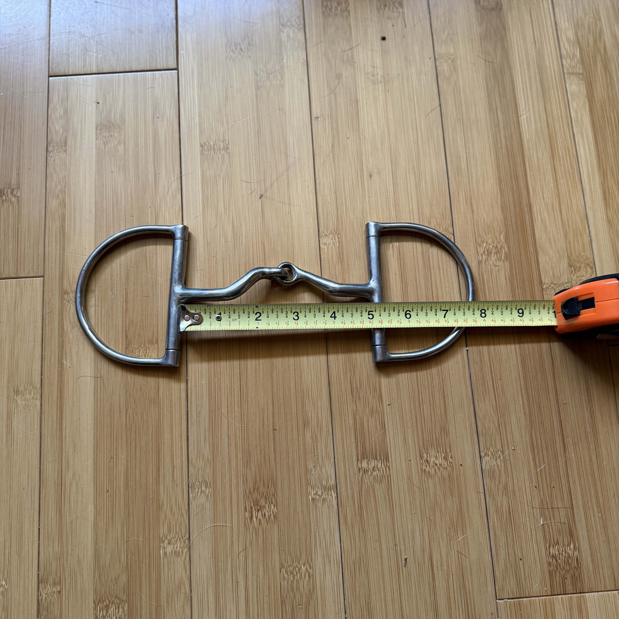 Broken mouth d ring horse bit with measurement.